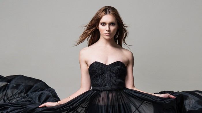 Alyson Stoner in a black dress