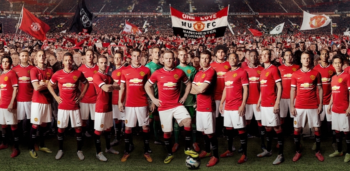 Manchester United Team Photo with Fans and Banners
