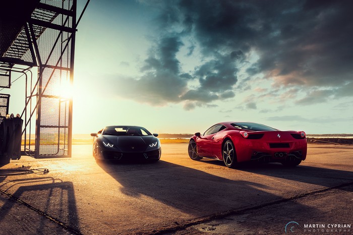 Lamborghini Huracan and Ferrari 458 at sunset