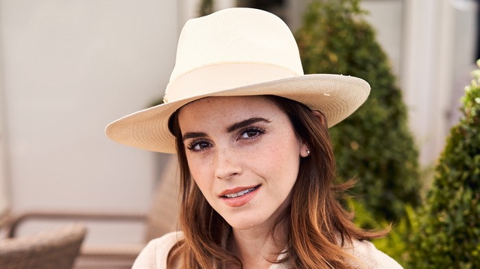 Emma Watson wearing a straw hat