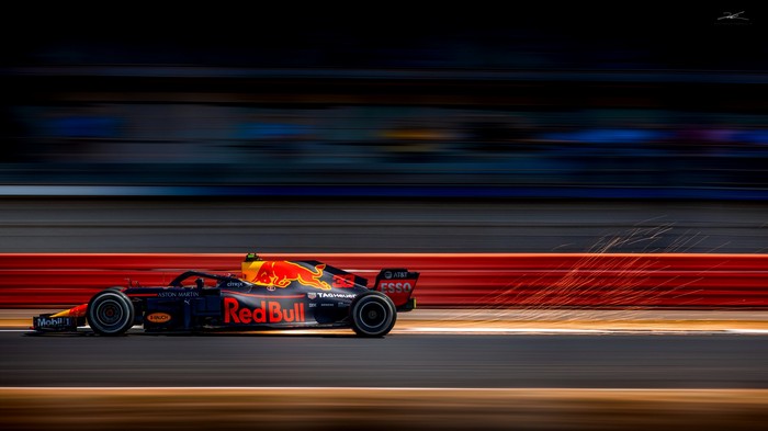 Red Bull Formula 1 car racing with sparks