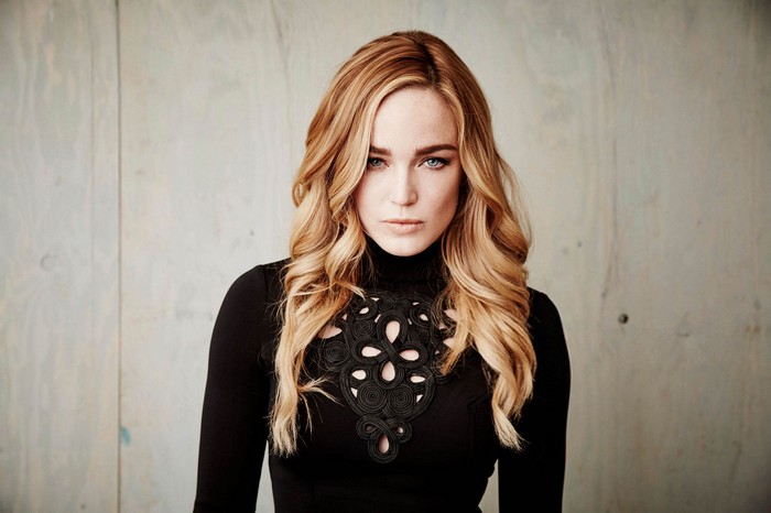 Caity Lotz in a black turtleneck