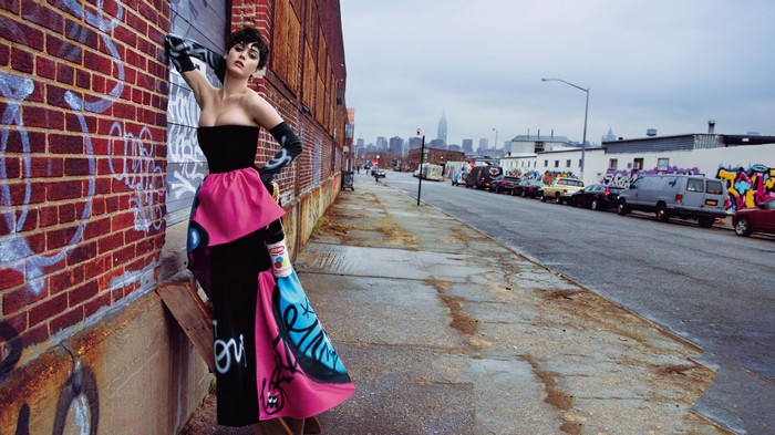 Katy Perry in a graffiti-covered urban setting