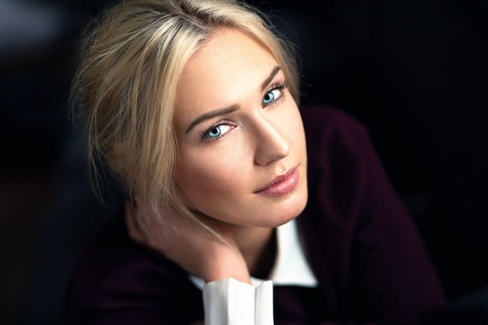 Amazing Portrait of Blonde Woman with Blue Eyes