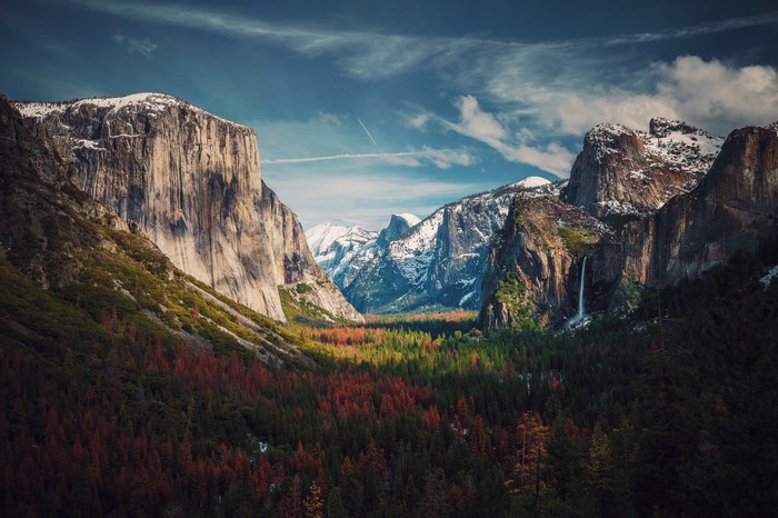 Yosemite National Park landscape with mountains and waterfall