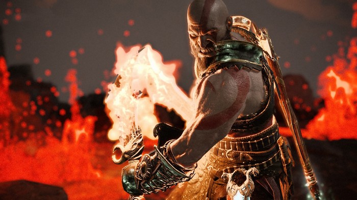 Kratos wielding a flaming weapon in God of War