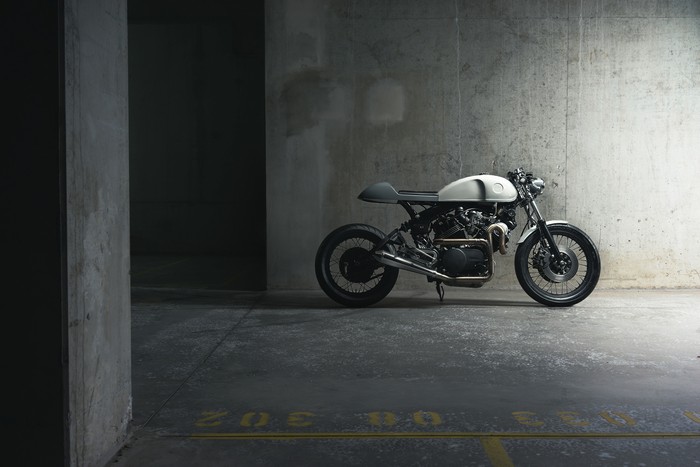 Yamaha XV 750 cafe racer motorcycle in a parking garage