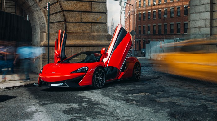 Red McLaren 570S Spider with Doors Open