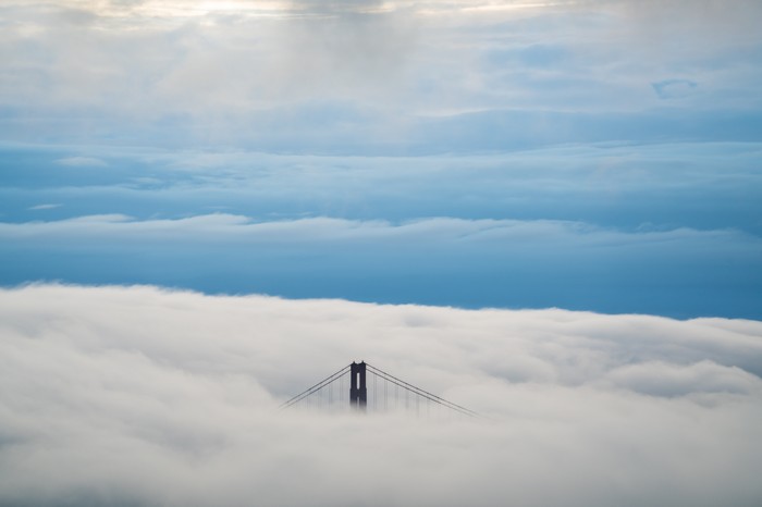 Golden Gate Bridge emerging from clouds