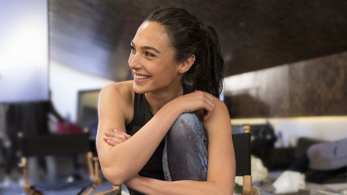 Gal Gadot smiling in athletic wear