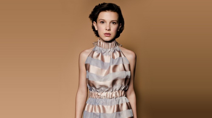 Millie Bobby Brown in a striped halter dress
