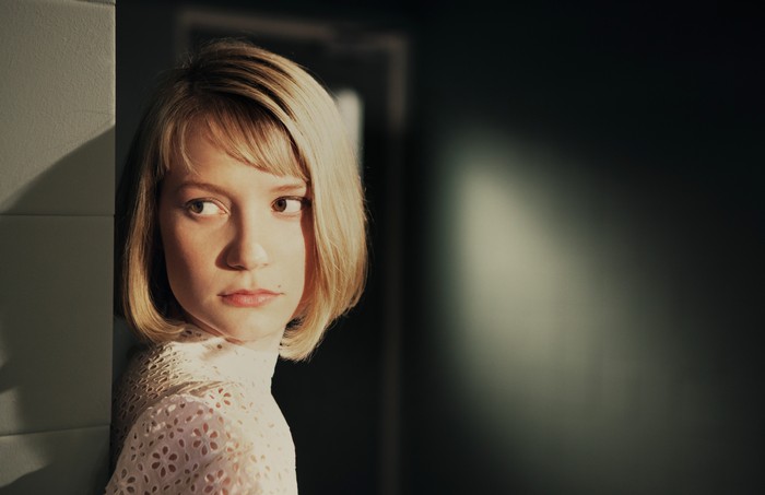 Mia Wasikowska looking away from the camera