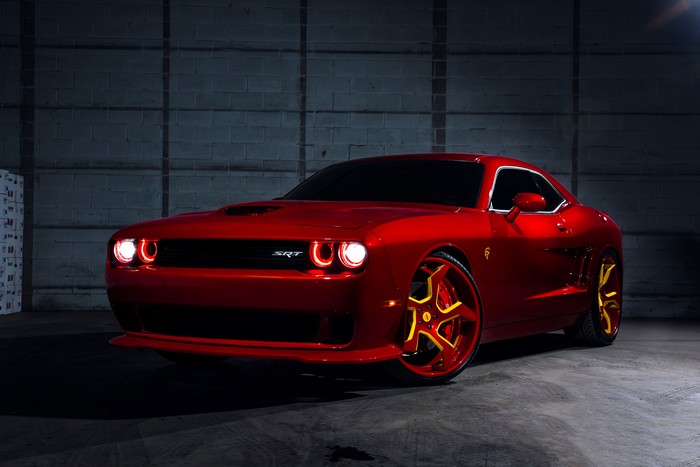 Red Dodge Challenger SRT with custom wheels