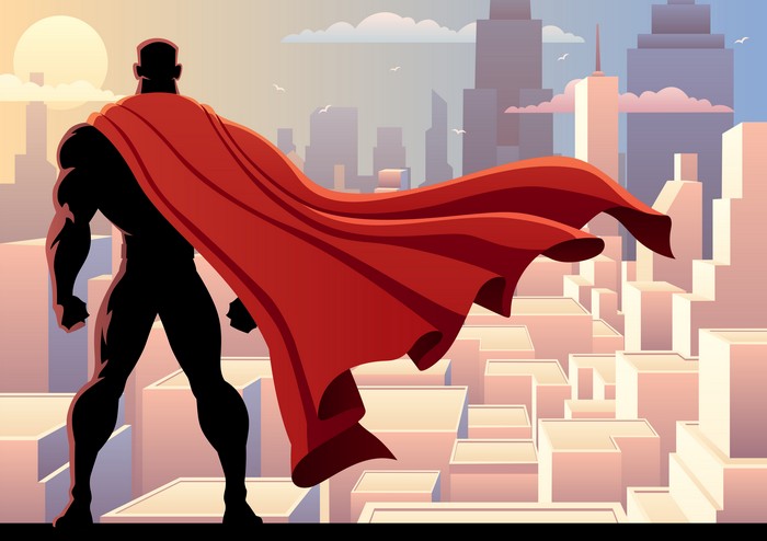 Superhero with Red Cape Overlooking City