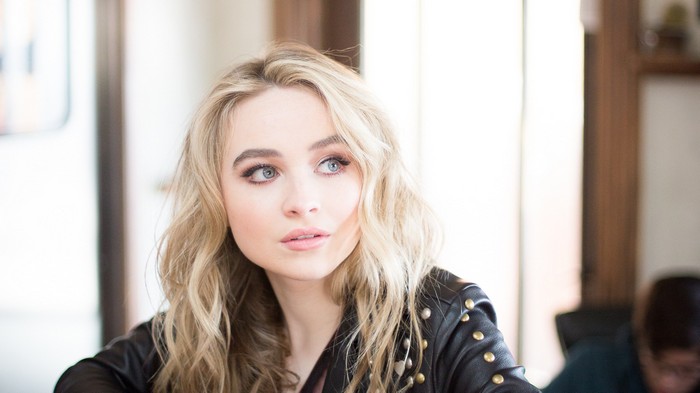 Sabrina Carpenter in a black leather jacket