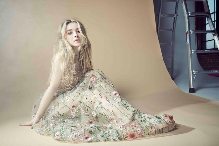 Sabrina Carpenter in a floral dress photoshoot