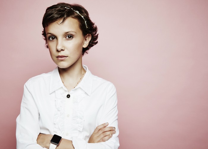 Millie Bobby Brown in a white shirt