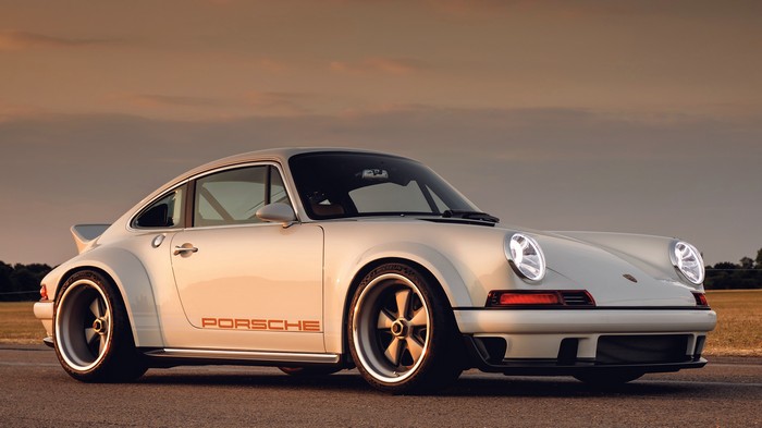 White Porsche 911 with Orange Decals