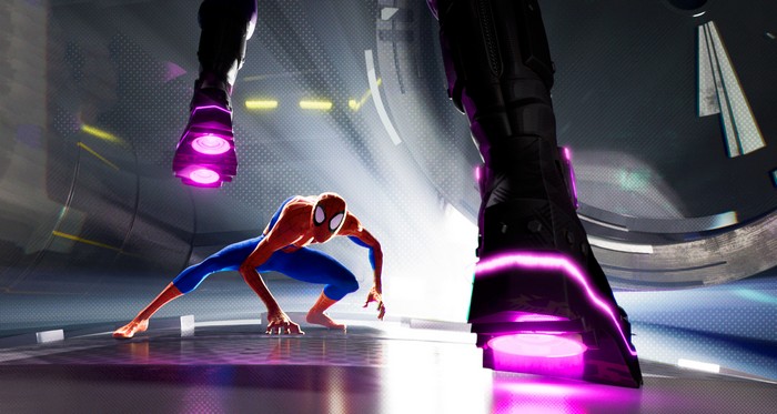 Spider-Man in a futuristic arena with giant robots