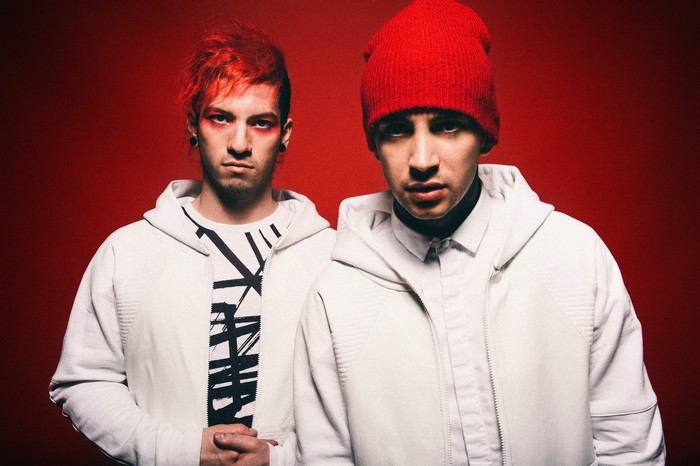 Twenty One Pilots duo in white jackets