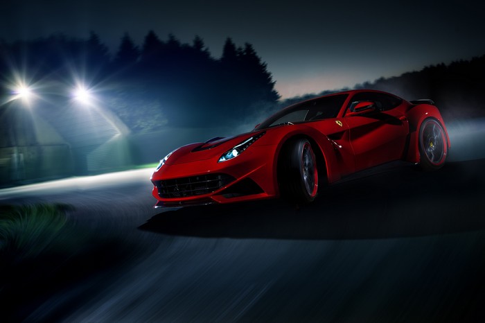 Red Ferrari F12 TDF driving at night
