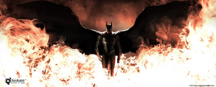 Batman standing in flames with large wings