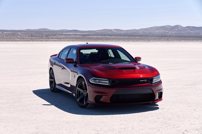 Red Dodge Charger SRT Hellcat in a desert landscape