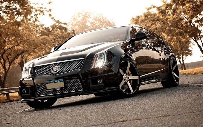 Black Cadillac CTS-V Coupe on Road