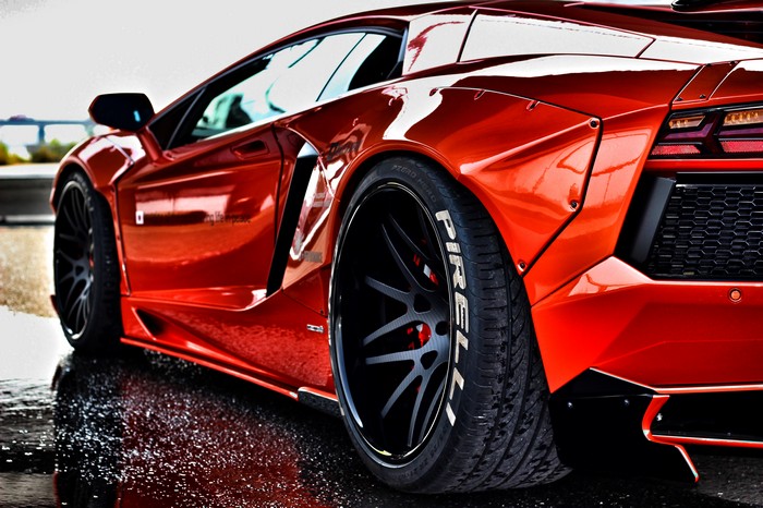 Red Lamborghini Aventador with Pirelli Tires