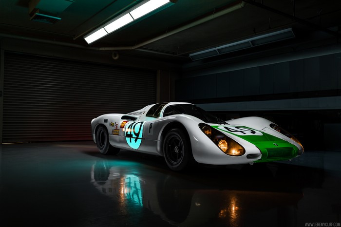 White Porsche 907 race car with green accents