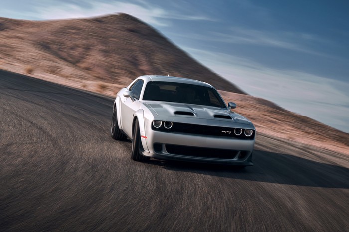 Silver Dodge Challenger SRT Hellcat Widebody driving on a road