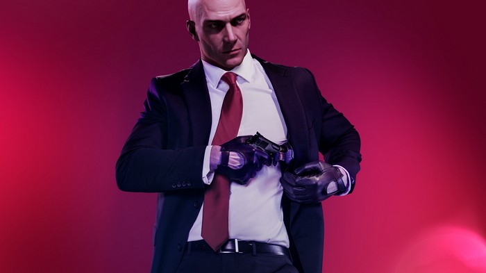 Agent 47 from Hitman holding a pistol