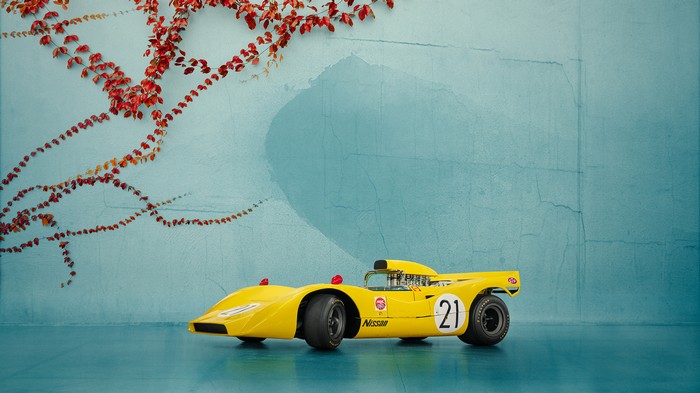 Yellow Nissan R382 racing car with number 21