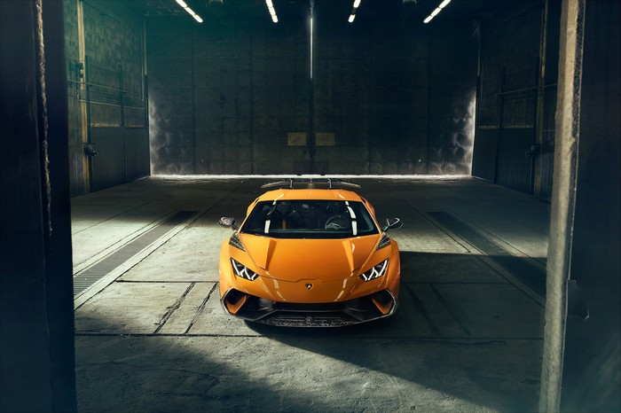 Orange Lamborghini Huracan Performante in a Garage