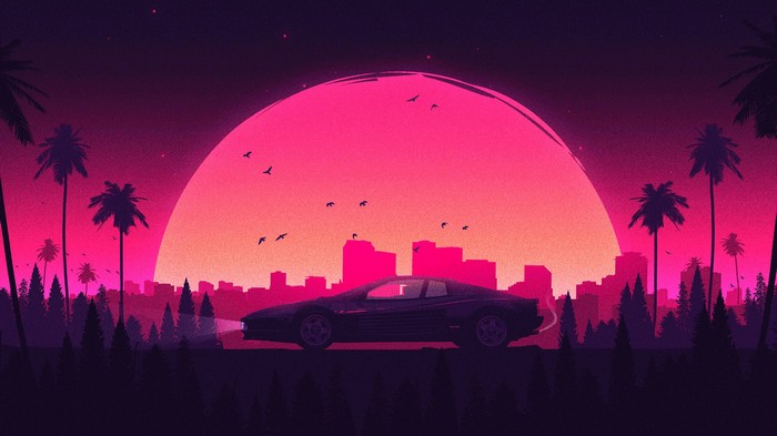 Retro car driving towards a city at sunset