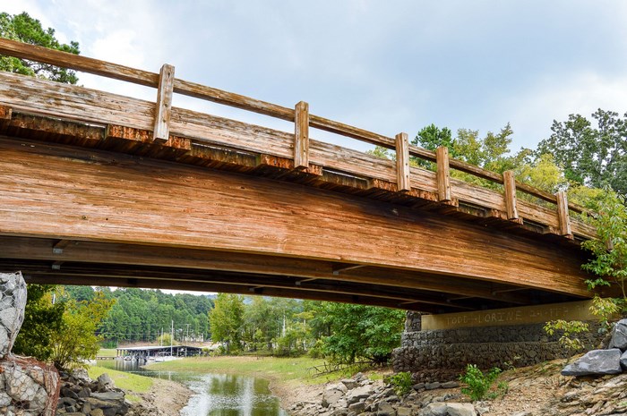 Wooden bridge over a dry creek bed