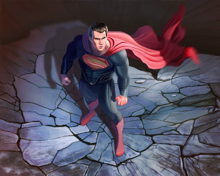 Superman standing on cracked ground