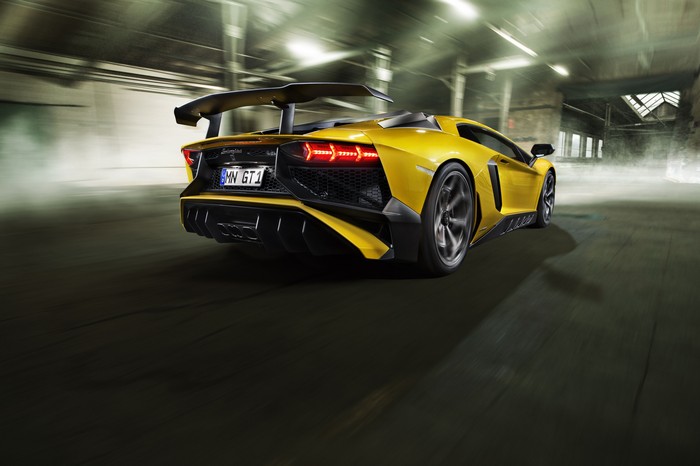 Yellow Lamborghini Aventador GT1 driving fast