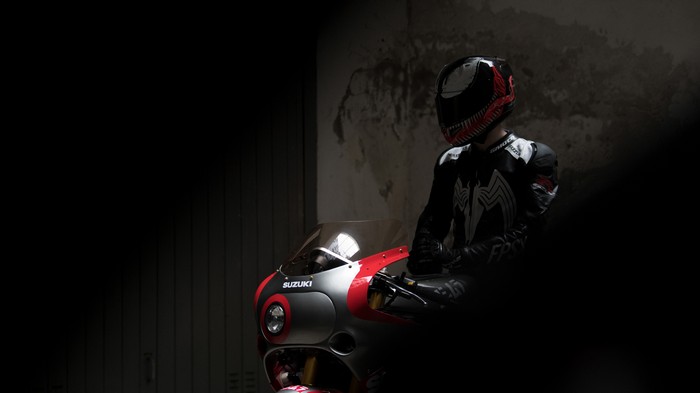 Suzuki motorcycle with Venom-themed rider