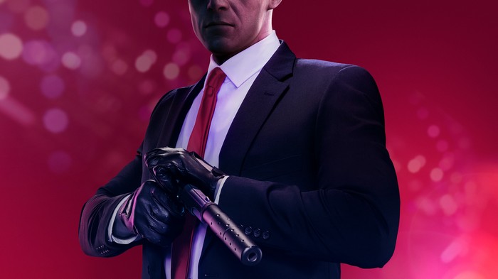Agent 47 from Hitman holding a silenced pistol