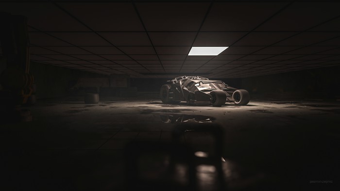The Batmobile in a dark garage