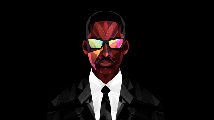Will Smith in a suit with colorful sunglasses