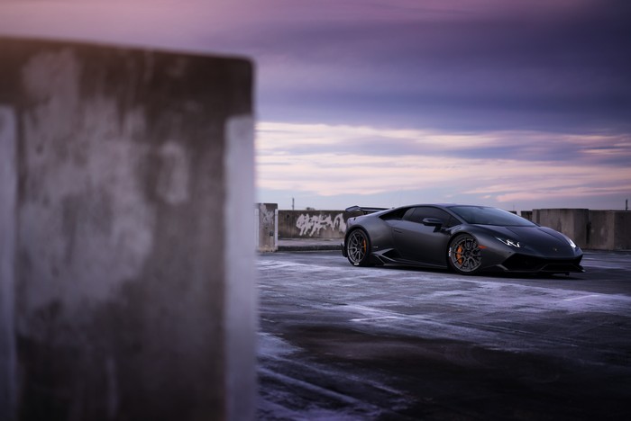 Lamborghini Huracan on a rooftop at sunset