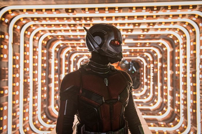 Ant-Man in a brightly lit corridor