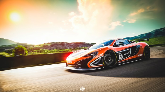 Orange McLaren 650S race car on a track