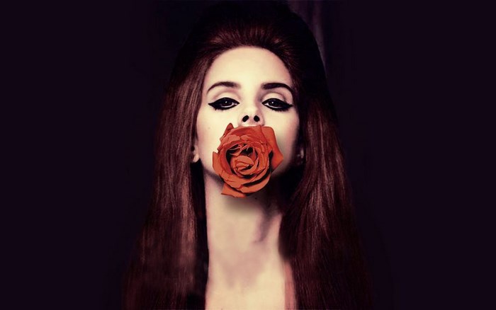 Lana Del Rey with a red rose