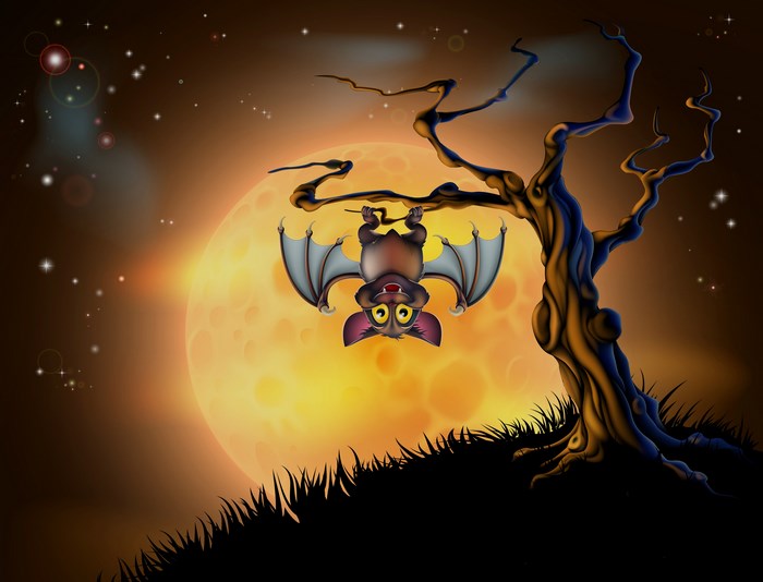 Bat hanging upside down on a tree branch with a large moon