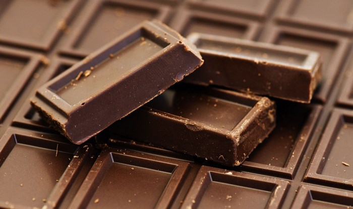 Close-up of dark chocolate bar pieces