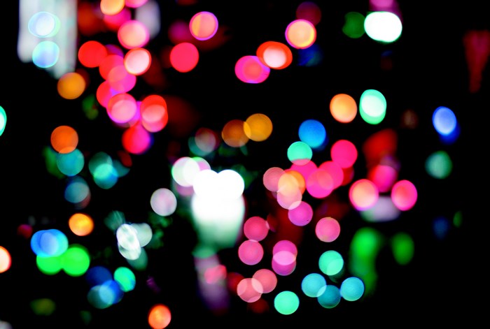 Bokeh lights in various colors on a black background
