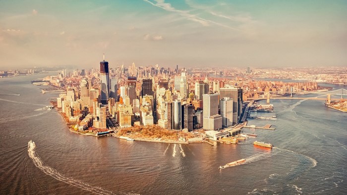 New York City Skyline with Bridges and Boats